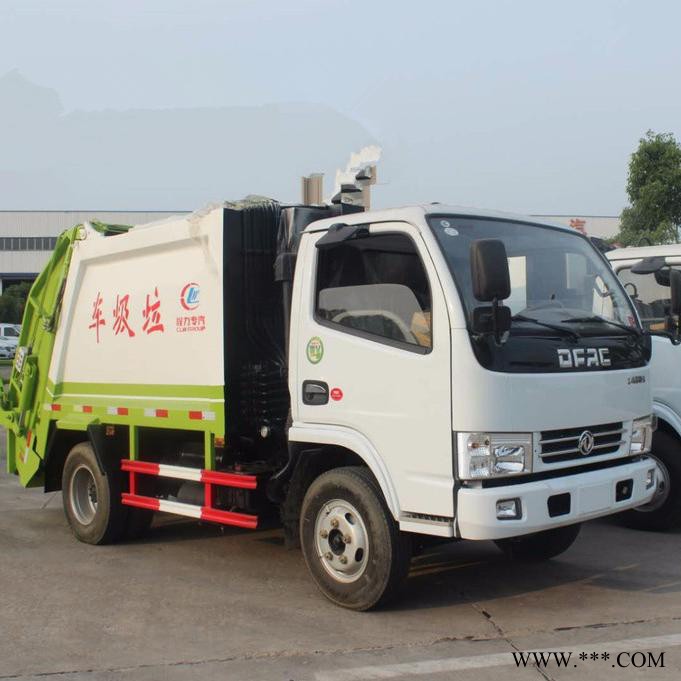 国五小多利卡4方蓝牌压缩式垃圾车 C证开的车