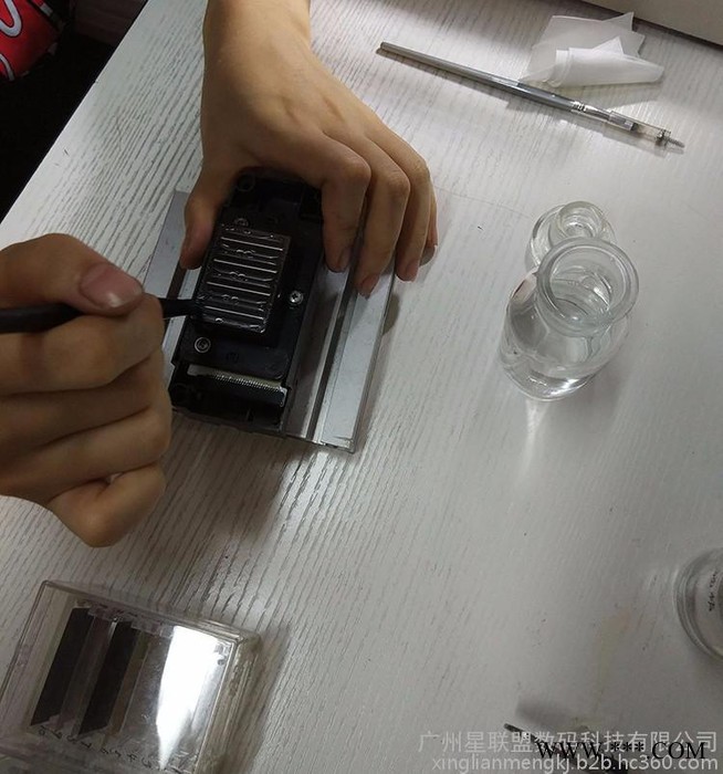 星联盟专业维修爱普生数码写真机五代喷头堵塞窜门墨膜片损坏修复等 写真机喷头维修