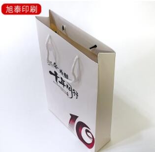 服装手提纸袋超市牛奶酸奶手提外装纸袋化妆品茶叶包装袋可印logo